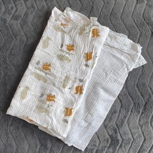Two Newcastle muslin swaddles